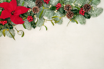 Image showing Poinsettia Flower Border and Winter Greenery 