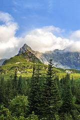 Image showing Polish Tatra mountains summer landscape with blue sky and white clouds.