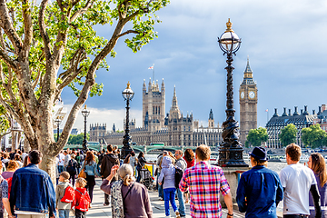 Image showing Crowd of people walking on the southern bank of the River Thames, London