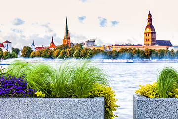 Image showing Urban flower pots with Riga old town skyline