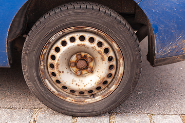 Image showing Car wheel with winter tyres