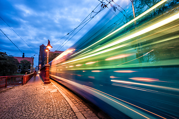 Image showing Fast moving tram blurred light trail