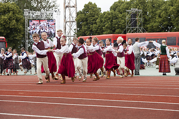 Image showing Dancers in traditional costumes perform at the Grand Folk dance 