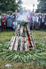 Image showing Crowd of people around bonfire celebrating Midsummer summer sols