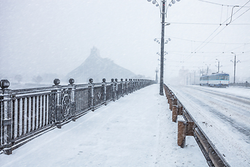 Image showing Almost empty street during heavy snow storm