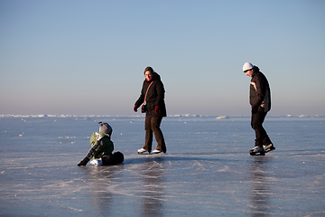 Image showing Family ice skating