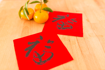 Image showing Chinese New Year Calligraphy with mandarin orange, words meaning