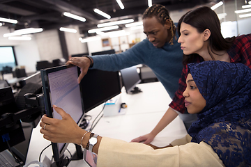 Image showing multiethnics team of software developers working together