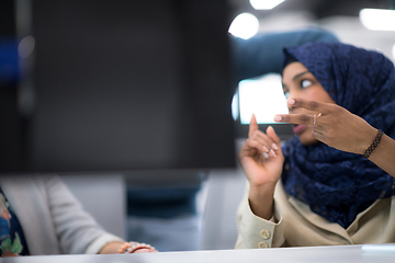 Image showing black muslim female software developer at work