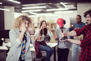 Image showing multiethnics business team boxing at office