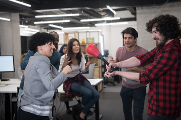 Image showing multiethnics business team boxing at office