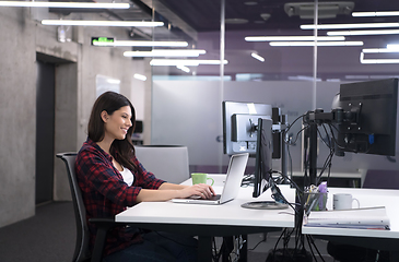 Image showing female software developer using laptop computer