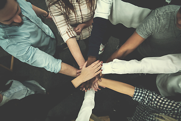 Image showing multiethnic Group of young business people celebrating success