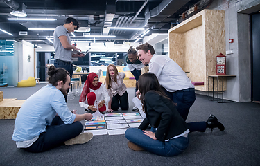 Image showing black muslim woman having meeting with Multiethnic  startup busi