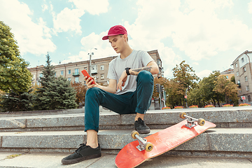 Image showing Skateboarder at the city\'s street in sunny day