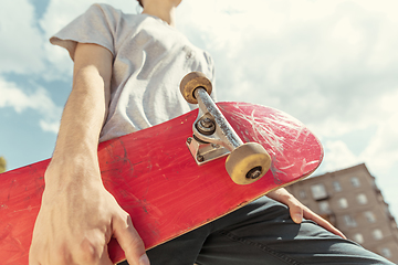 Image showing Skateboarder at the city\'s street in sunny day