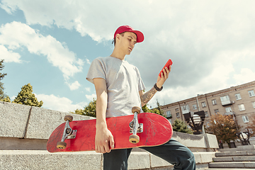 Image showing Skateboarder at the city\'s street in sunny day