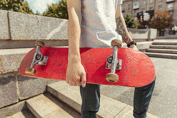 Image showing Skateboarder at the city\'s street in sunny day