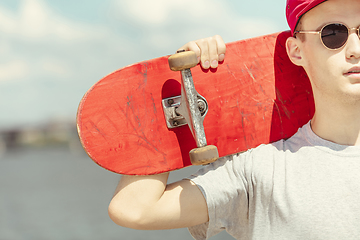 Image showing Skateboarder at the city\'s street in sunny day