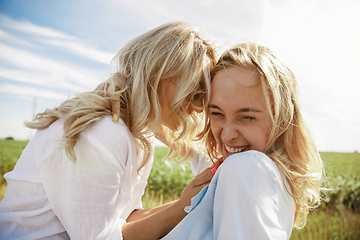 Image showing Young lesbian\'s couple going to vacation trip on the car in sunny day