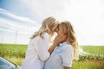 Image showing Young lesbian\'s couple going to vacation trip on the car in sunny day