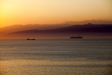 Image showing Mediterranean sunset with a cruise ship