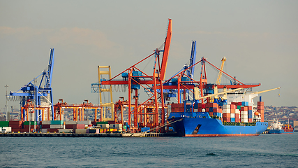 Image showing Cargo sea port. Sea cargo cranes. Sea. Container ship.