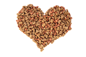 Image showing Dried cat food biscuits in a heart shape