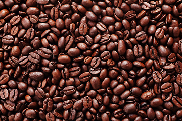 Image showing Rich brown roasted coffee beans background