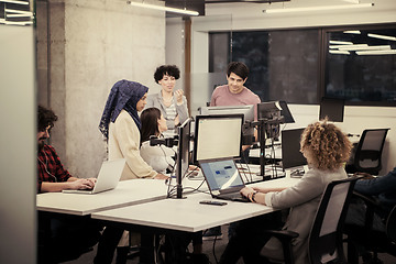 Image showing multiethnics team of software developers working together
