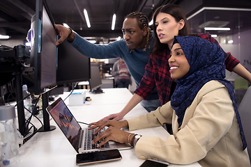 Image showing multiethnics team of software developers working together