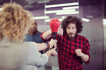 Image showing multiethnics business team boxing at office