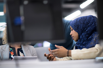 Image showing black muslim female software developer at work