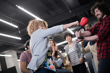 Image showing multiethnics business team boxing at office