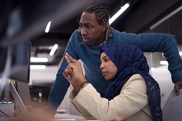 Image showing young black muslim female software developer at work