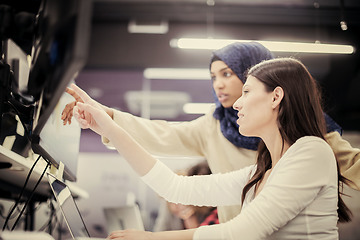 Image showing multiethnics team of software developers working together