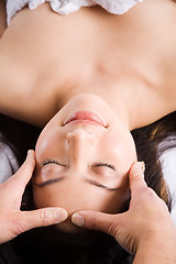 Image showing Beautiful asian woman spa massage