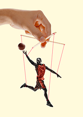 Image showing Man like a puppet in somebodies hands. Concept of manipulation