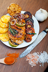 Image showing roasted grilled BBQ chicken breast with herbs and spices 