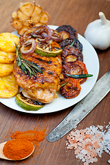 Image showing roasted grilled BBQ chicken breast with herbs and spices 