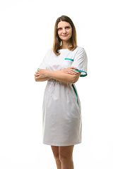 Image showing Girl in white medical gown, isolated on white background