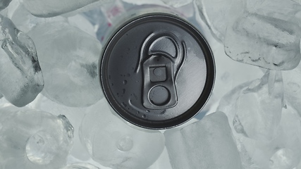 Image showing Aluminum Soda Tin Can Rotating in cool Ice motion footage