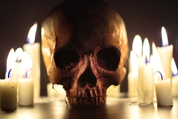 Image showing Human skull in candle light closeup