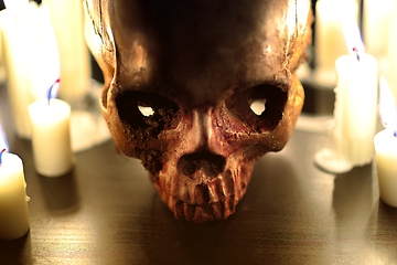 Image showing Human skull in candle light closeup