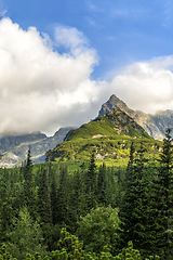 Image showing Polish Tatra mountains summer landscape with blue sky and white clouds.