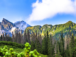 Image showing Polish Tatra mountains summer landscape with blue sky and white clouds.