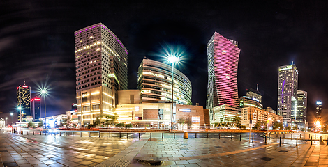 Image showing Night skyline of Warsaw with soviet era and modern skyscrapers. 