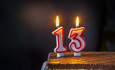 Image showing Thirteenth Birthday cake with candles