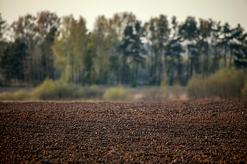 Image showing Plowed field in spring season.