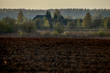 Image showing Plowed field in spring season.